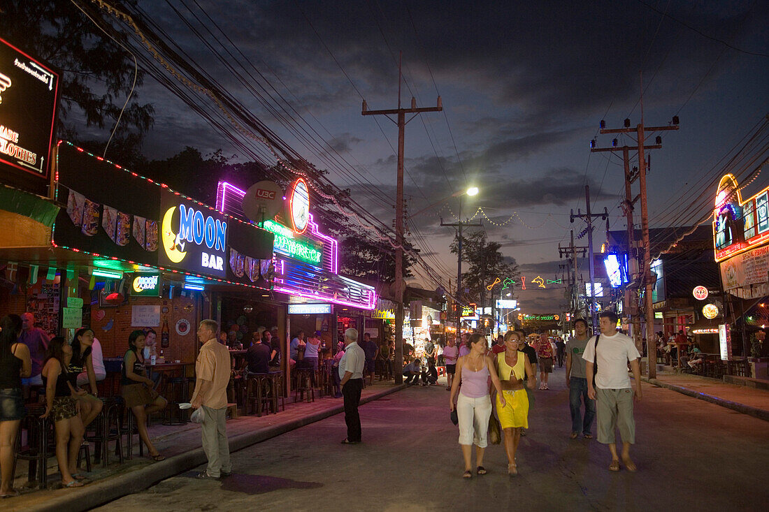 Tourists strolling over Bang-La Road in the late evening, bar district, Patong Beach, Ao Patong, Hat Patong, Phuket, Thailand, after the tsunami