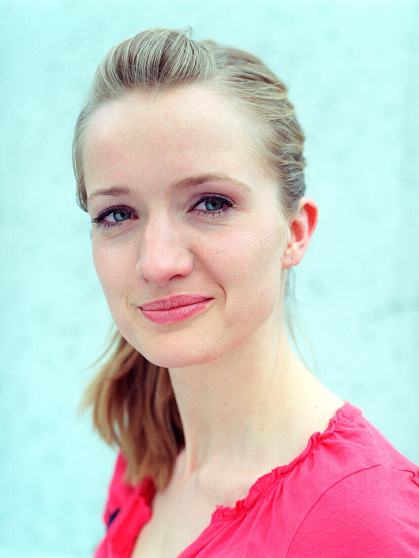 Young woman, looking at camera, portrait