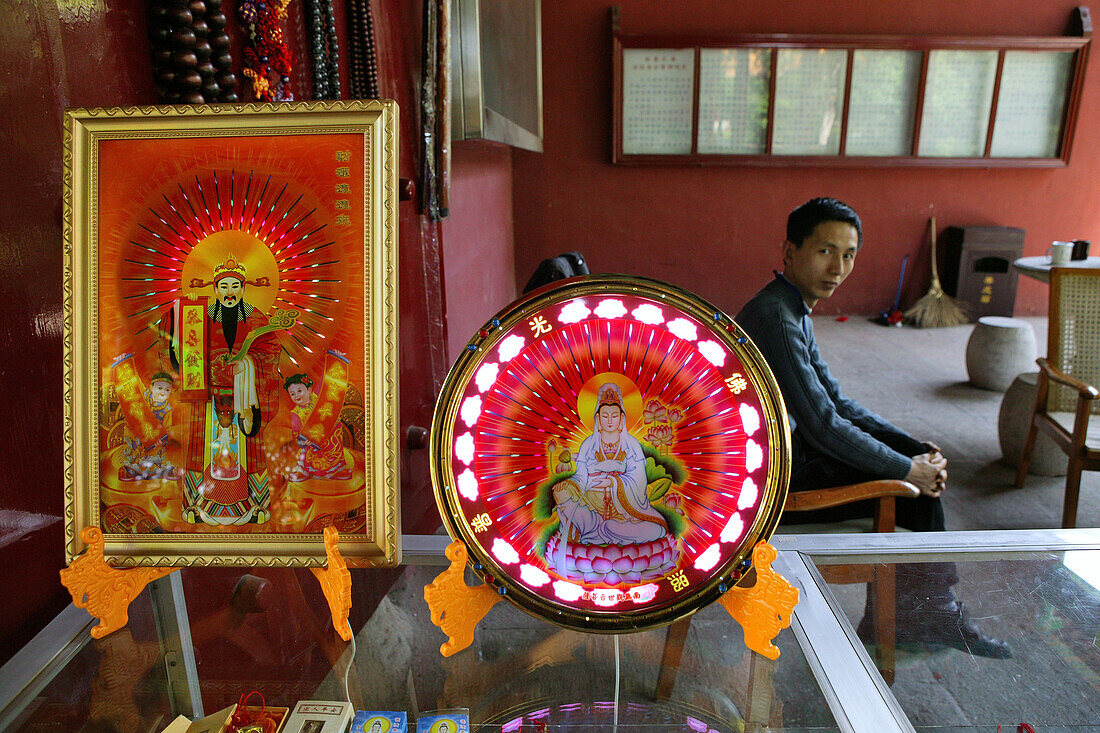 Illuminated Buddha images at a souvenir shop, Heng Shan South, Hunan province, China, Asia