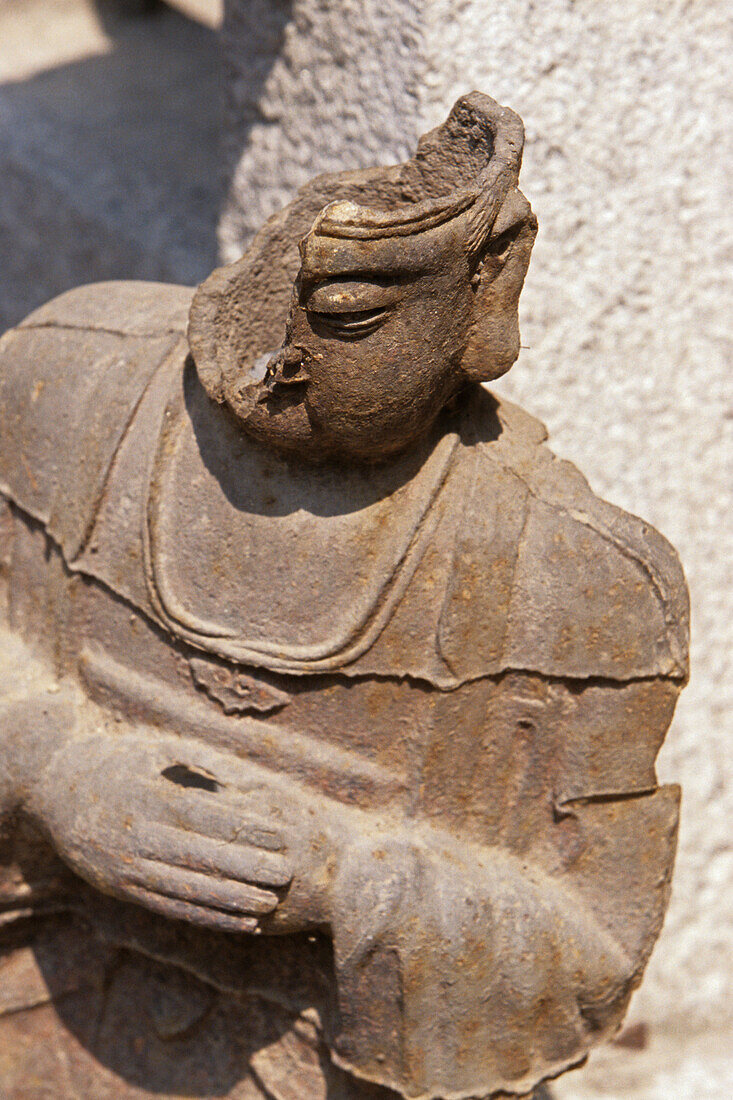 broken cast iron statue, destroyed during cultural revolution, monastery Hua Shan, Shaanxi province, Taoist mountain, China, Asia