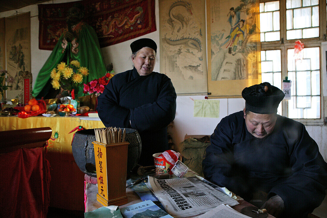 A monk and a nun at the monastery at Golden Lock Pass, Hua Shan, Shaanxi province, China, Asia
