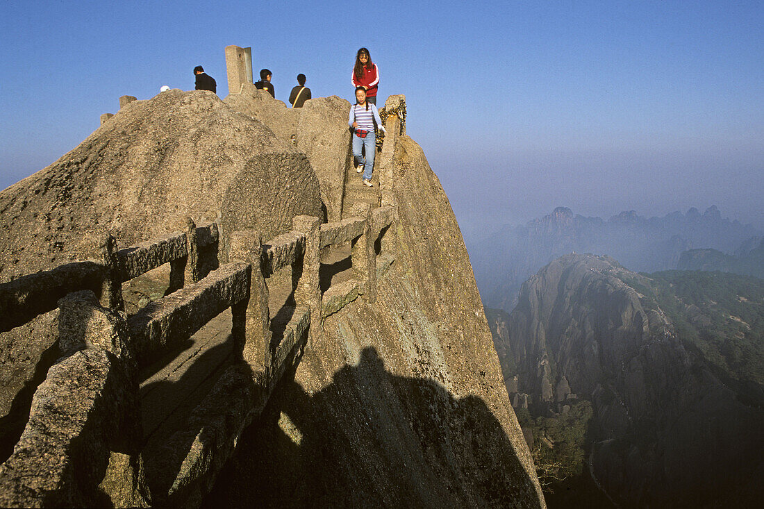steep rock carved stone steps to Lotus Peak, Huang Shan, Anhui province, steep climb, stone steps, World Heritage, UNESCO, China, Asia