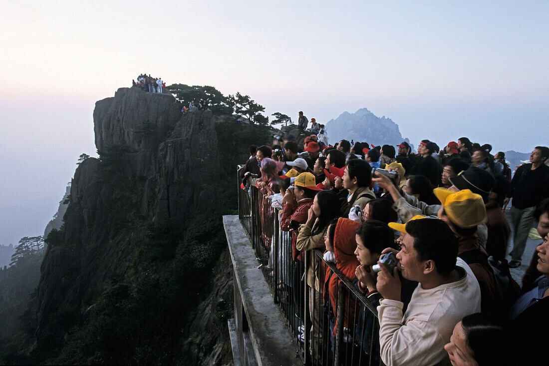 Tourist group, Huang Shan, Anhui province, steep climb, stone steps, Peak of Shining Light, World Heritage, UNESCO, China, Asia