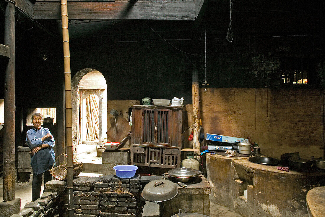 traditional kitchen, timber house in Chengkun, ancient village, living museum, China, Asia, World Heritage Site, UNESCO