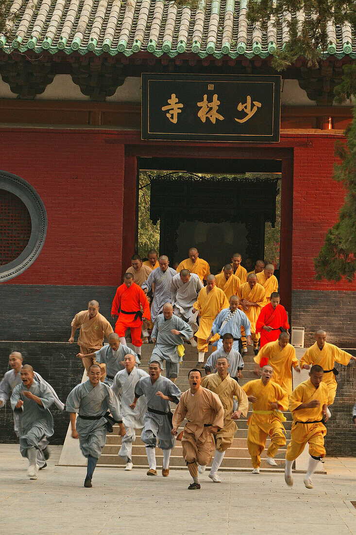 Shaolin Buddhist monks rehearse for a performance on Buddhas birthday, Shaolin Monastery, known for Shaolin boxing, Taoist Buddhist mountain, Song Shan, Henan province, China, Asia