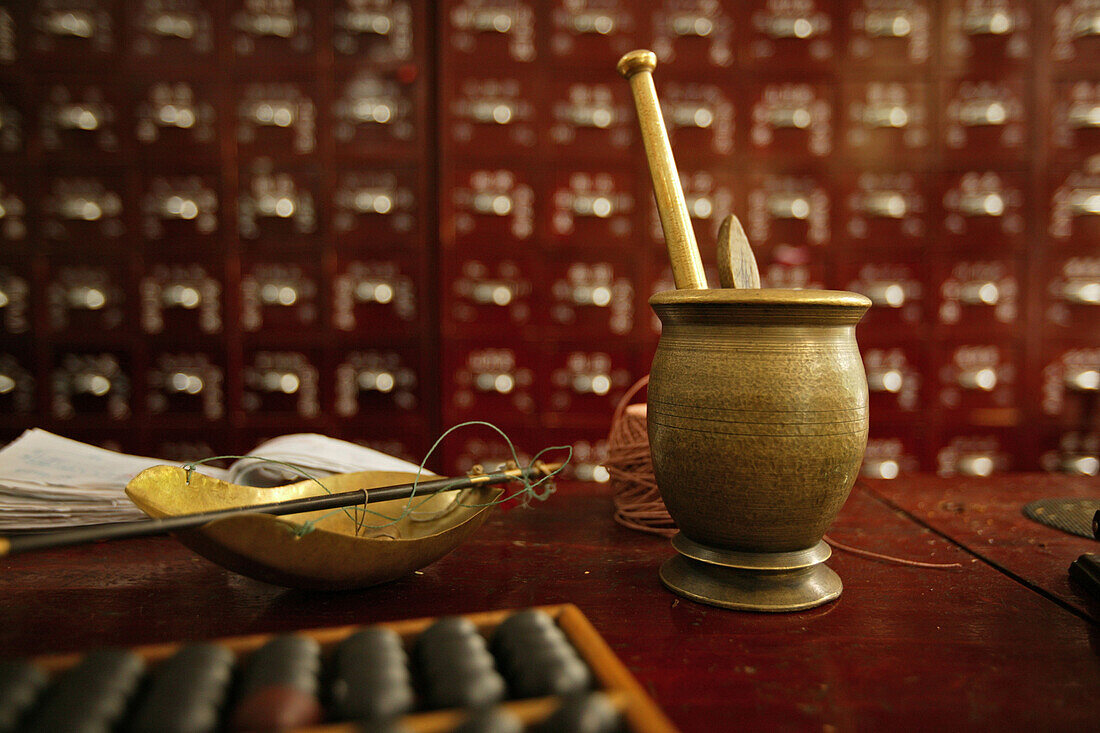 Interior view of a deserted pharmacy, view at mortar and drawers, Chengdu, China, Asia