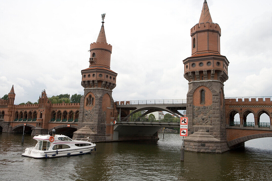 Connoisseur Caprice Houseboat at Oberbaumbruecke,Connecting Kreuzberg and Friedrichshain, River Spree, Berlin, Germany