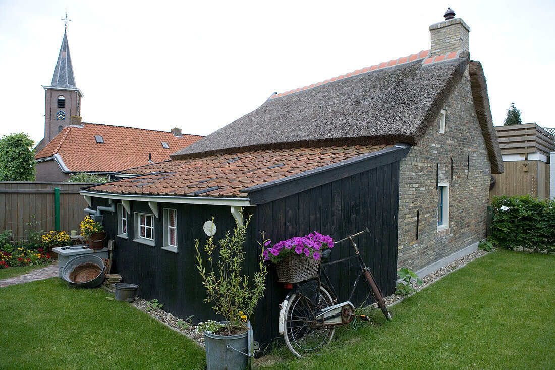Quaint Cottage & Bicycle with Flowers,Earnewald, Frisian Lake District, Netherlands
