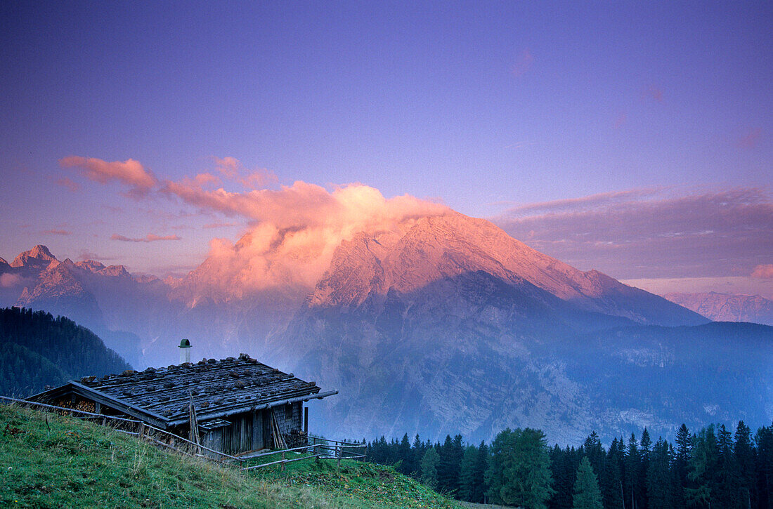 Traditional alpine hut in front of the Watzmann in the morning light, Berchtesgaden Range, Upper Bavaria, Bavaria, Germany