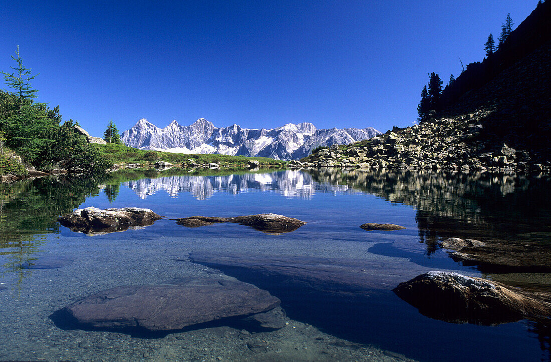 Gasselsee mit Dachsteingruppe und Spiegelung, Schladminger Tauern, Steiermark, Österreich