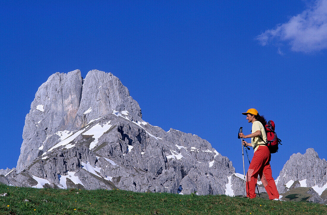 Mountaineer in front of Bischofsmuetze, Gosaukamm, Dachstein mountain range, Salzburg, Austria
