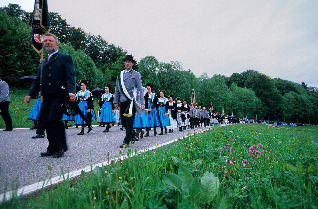 Women wearing dirndl dresses and men in traditional dress, pilgrimage to Maria Eck, Siegsdorf, Chiemgau, Upper Bavaria, Bavaria, Germany