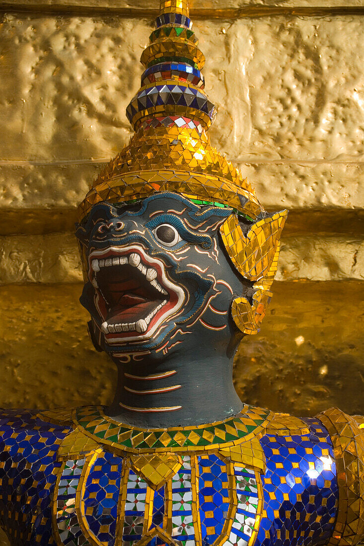 Close-up of a caryatid of a golden Chedi, Wat Phra Kaew, the most important Buddhist temple of Thailand, Ko Ratanakosin, Bangkok, Thailand