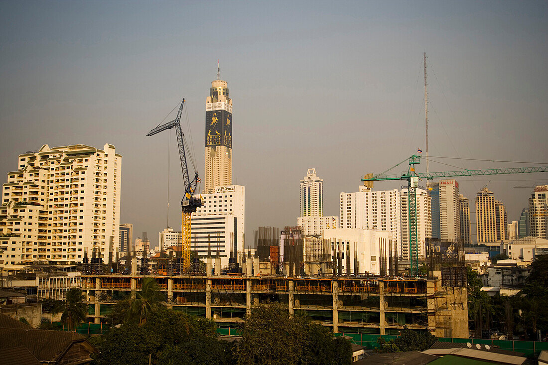 View over a constructions site to Baiyoke Tower II, the tallest building in Thailand, Ratchathewi, Bangkok, Thailand