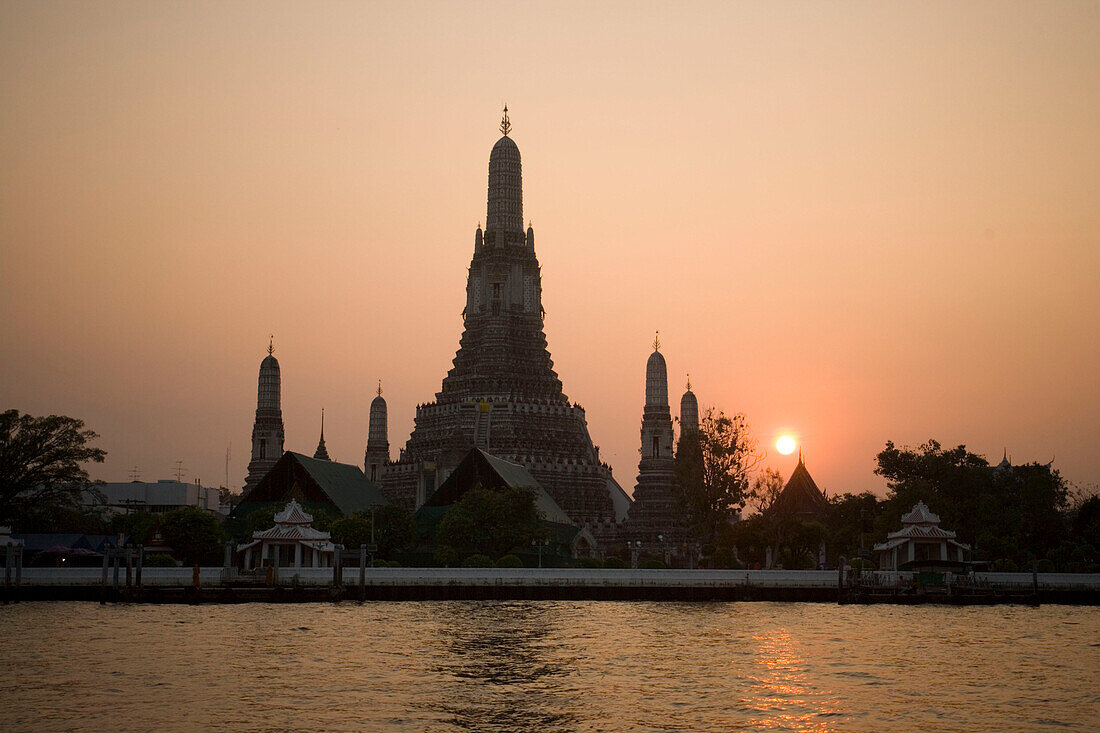 View over the river Menam Chao Phraya to Wat Arun, Temple of Dawn, Bangkok, Thailand