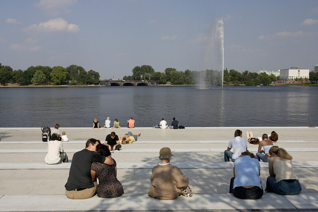 People sitting at Inner Alster Lake, Hamburg, Germany
