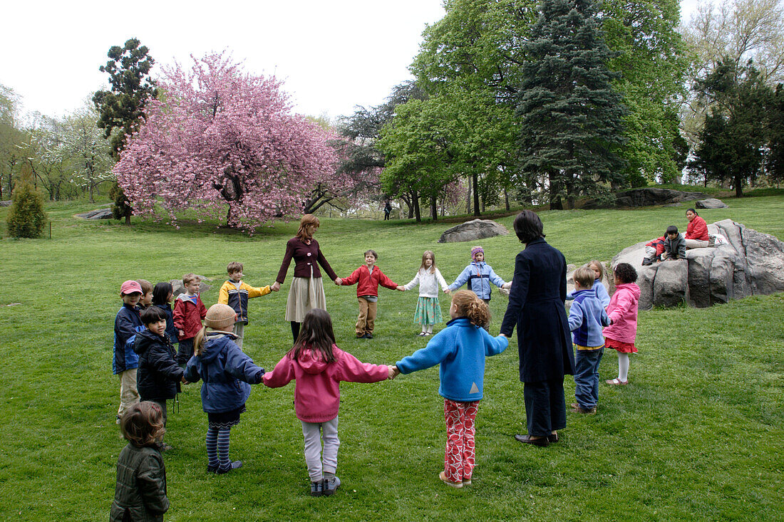 Kindergarden, children playing in Central Park, Spring, Manhattan, New York City, New York, United States of America, U.S.A.