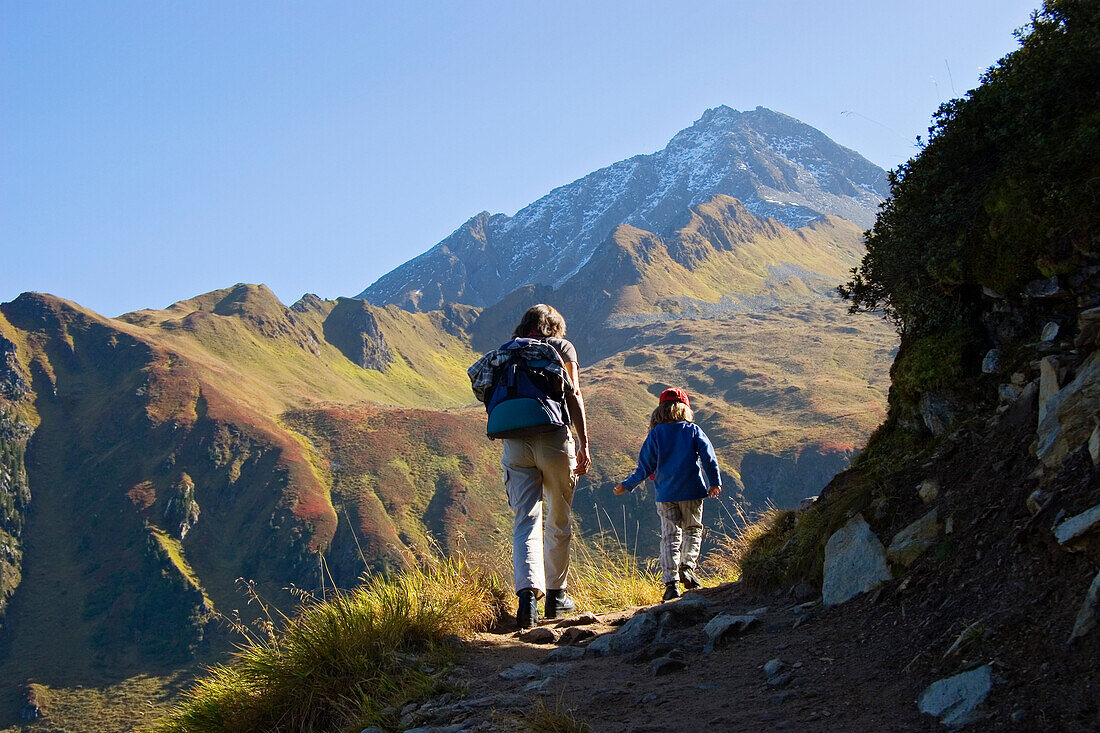 mountain hiking mother and daughter, Zillertal, Alps, Austria