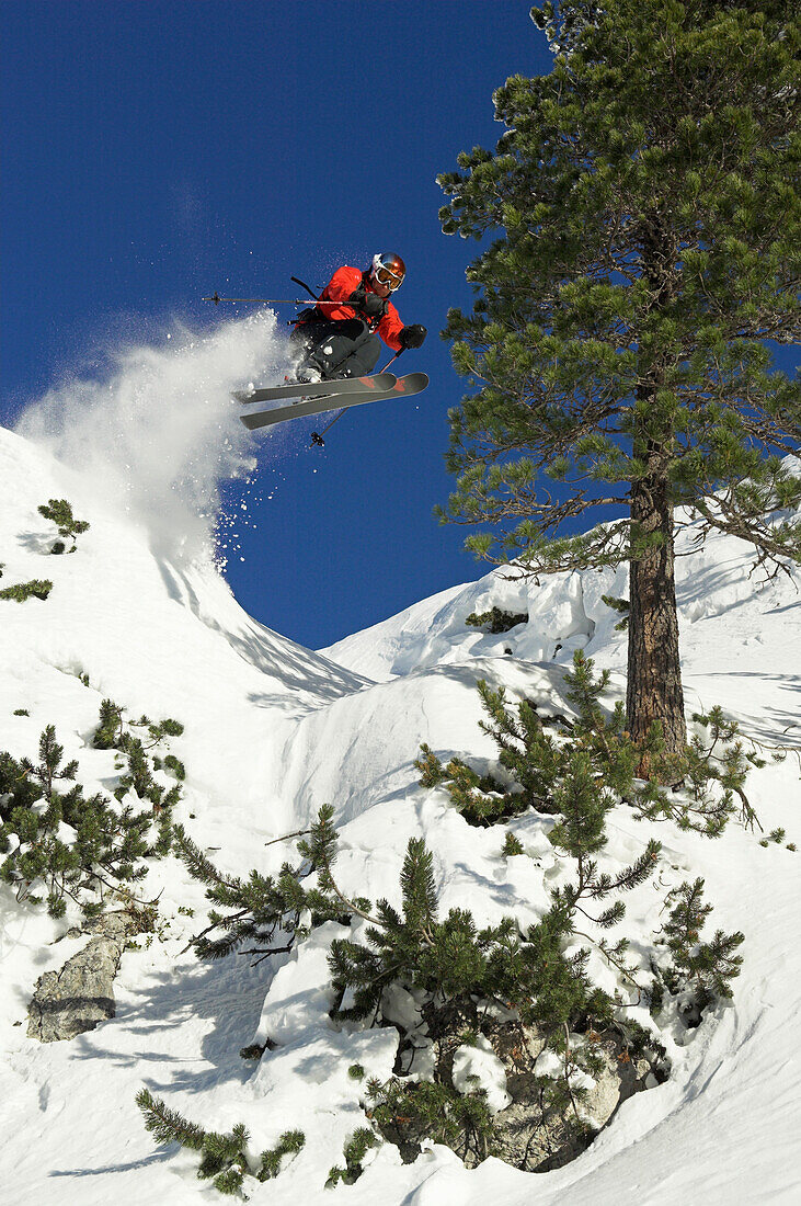 A man skiing in powder snow at Krippenstein, Dachstein, Obertraun, Upper Austria, Austria