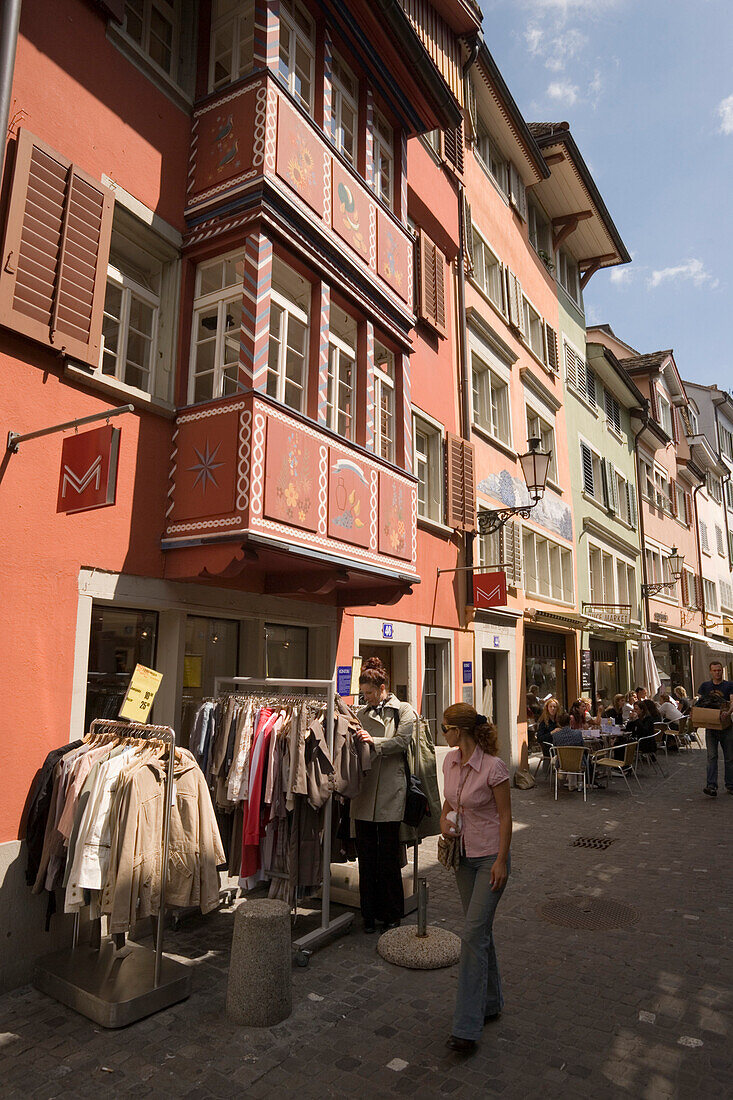 Woman passing a boutique, Augustinergasse, Zurich, Canton Zurich, Switzerland