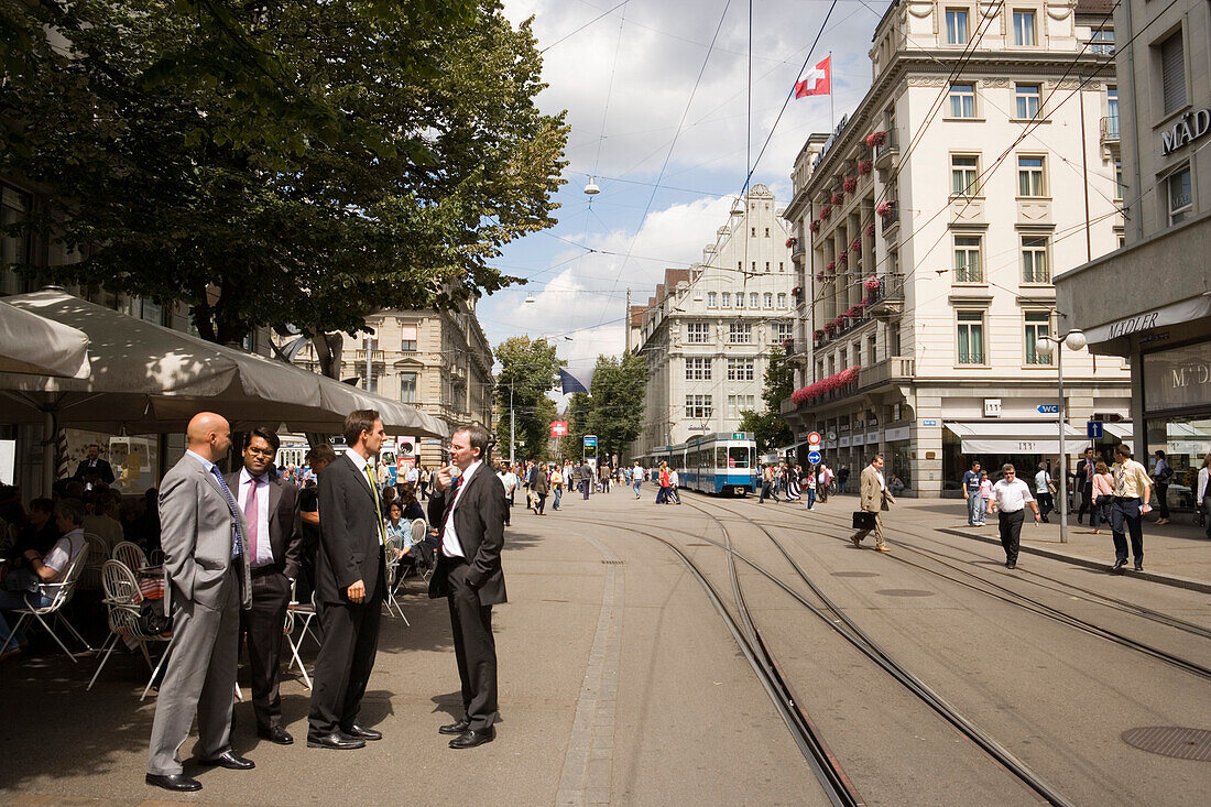 Group of businessmen passing Bahnhofstrasse (most expensive real estate prices in the world), Zurich, Canton Zurich, Switzerland