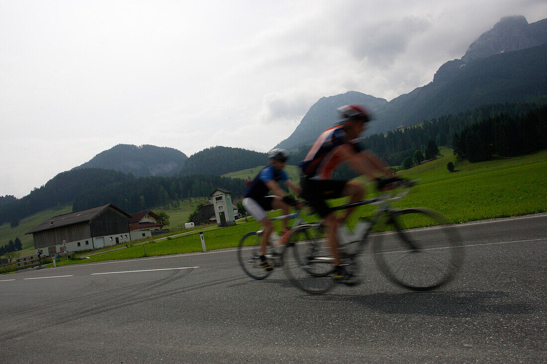 Two cyclists in Lammertal, Salzburg, Austria