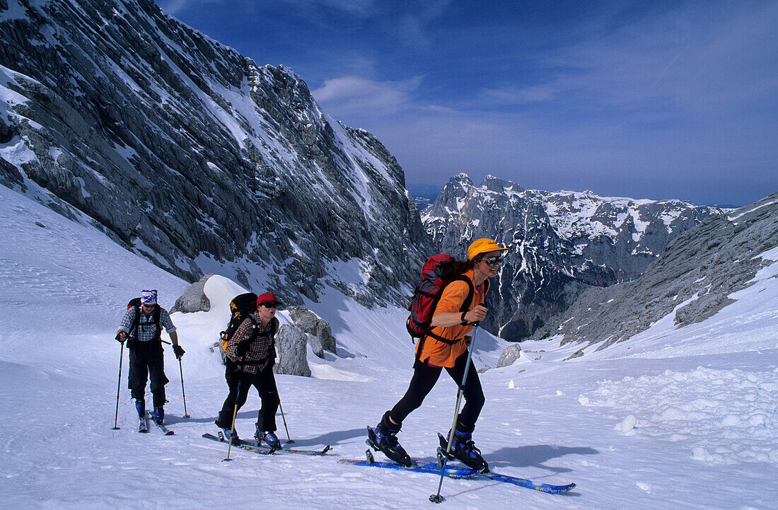 Three backcountry skier at Hochkalter, Berchtesgaden range, Upper Bavaria, Bavaria, Germany