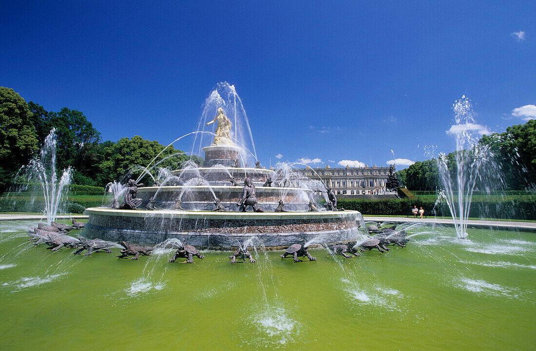 Fountain in front of castle of Herrenchiemsee, island of Herrenchiemsee, Lake Chiemsee, Chiemgau, Upper Bavaria, Bavaria, Germany