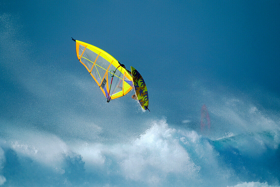 Windsurfer jumping the waves, Windsurfing, Hawaii, USA, America