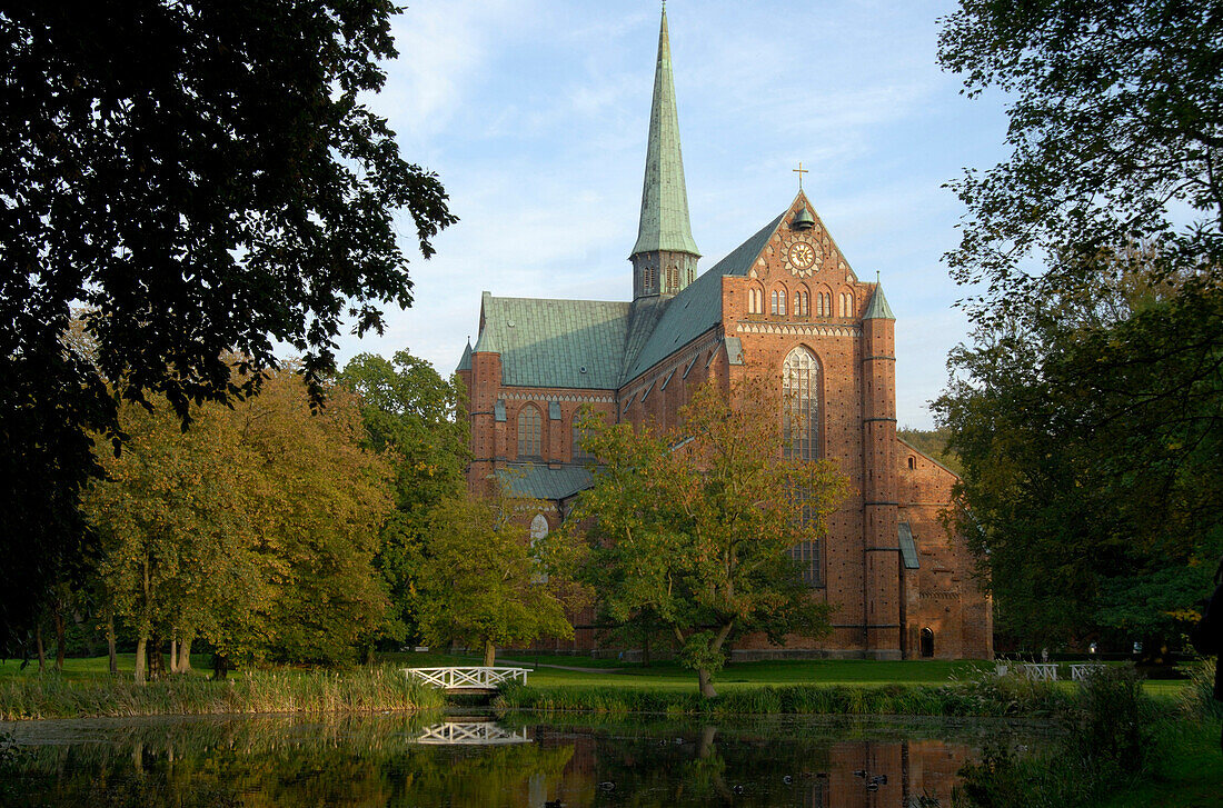 The Bad Doberan minster at an idyllic lake, Mecklenburg-WesternPomerania, Germany, Europe