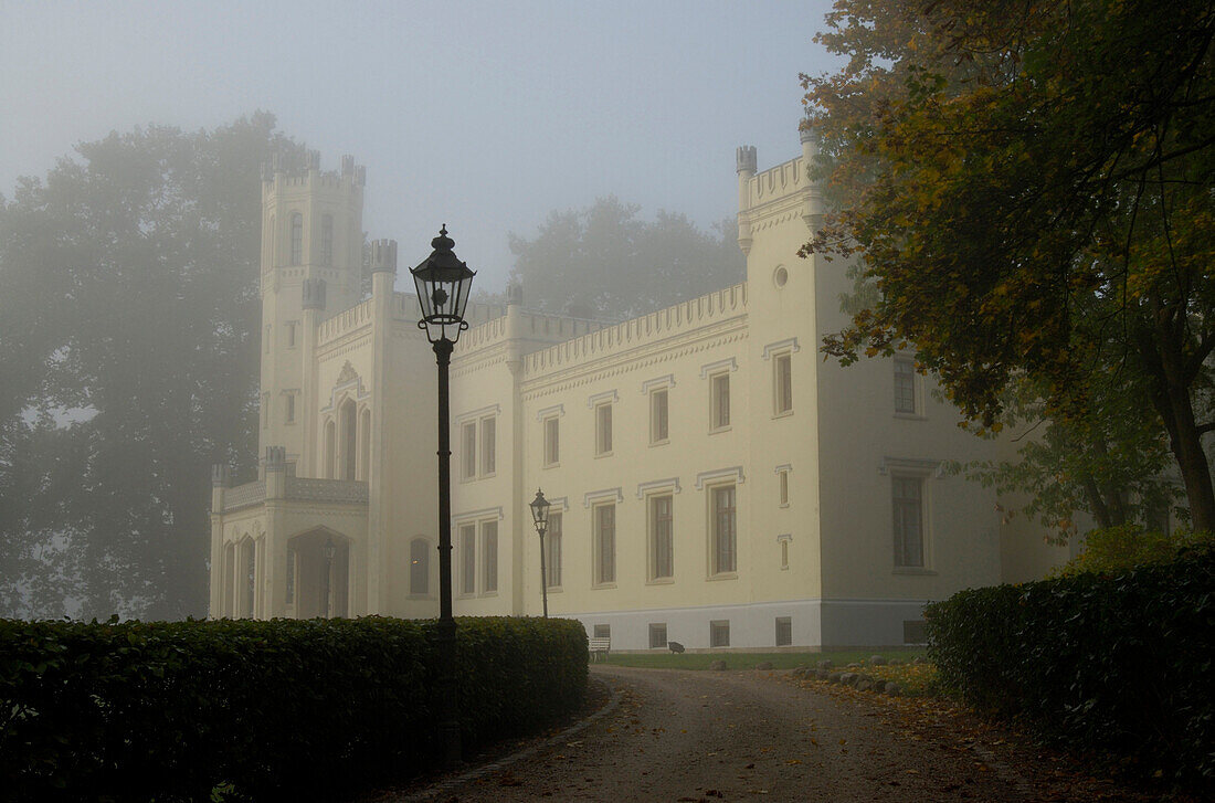 Kittendorf castle in the fog, Stavenhagen, Mecklenburg-Western Pomerania, Germany, Europe