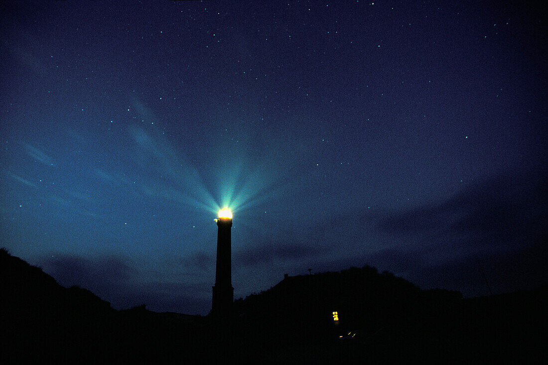 Lighthouse at night with starry sky, Norderney Island, Germany