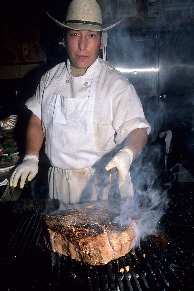 Grilling a steak, The Big Texan Steak Ranch, Amarillo, Texas, USA