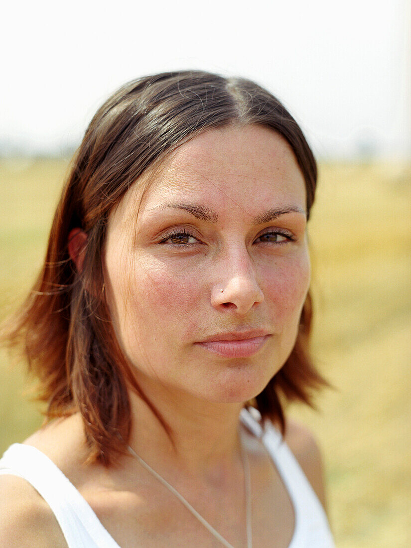 Woman looking at camera, portrait