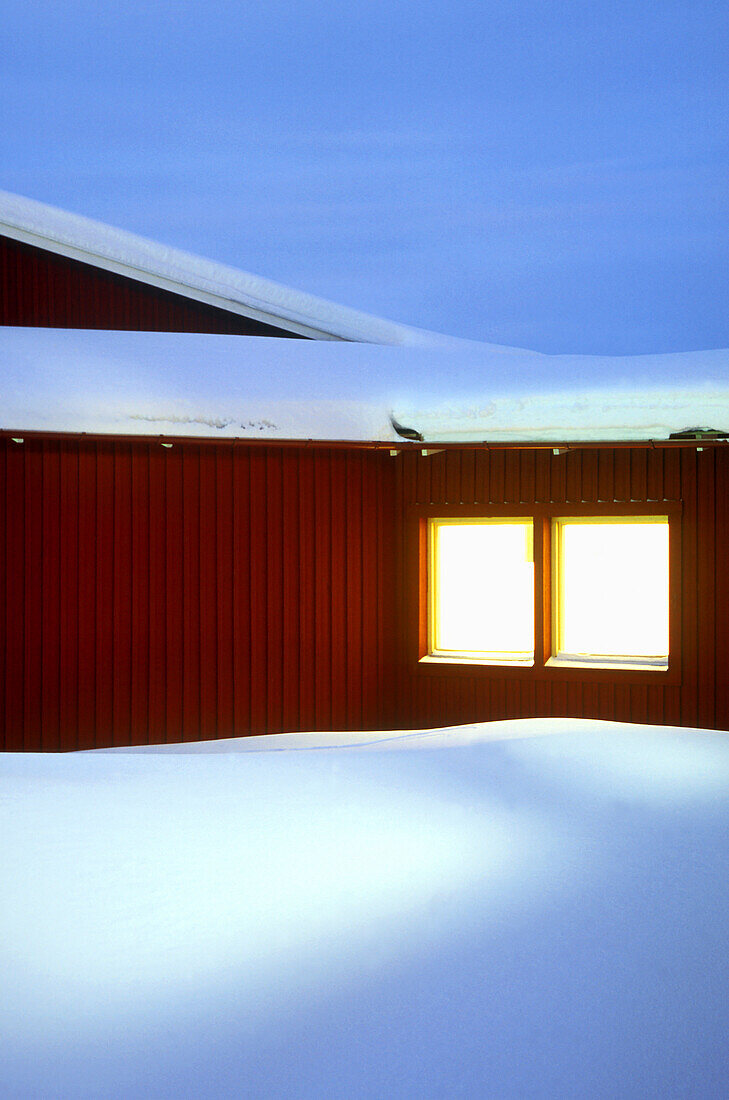 Snow covered hotel in the evening, Arjeplog Municipality, Lappland, Sweden