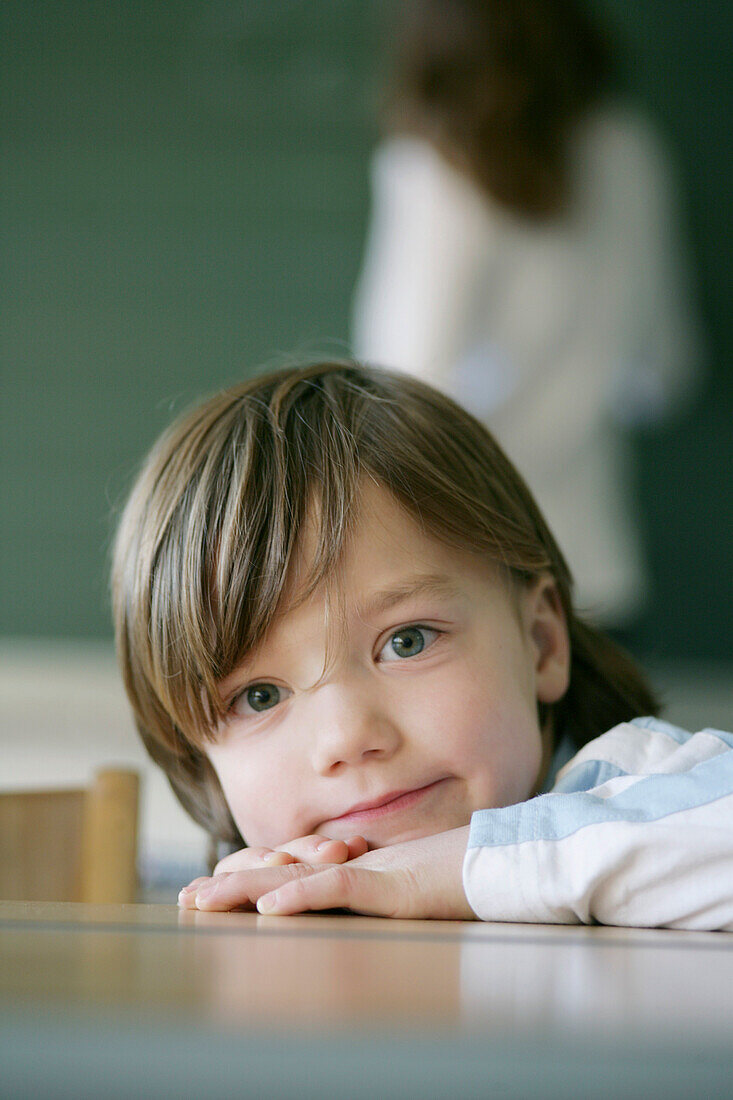 Boy in classroom, portrait