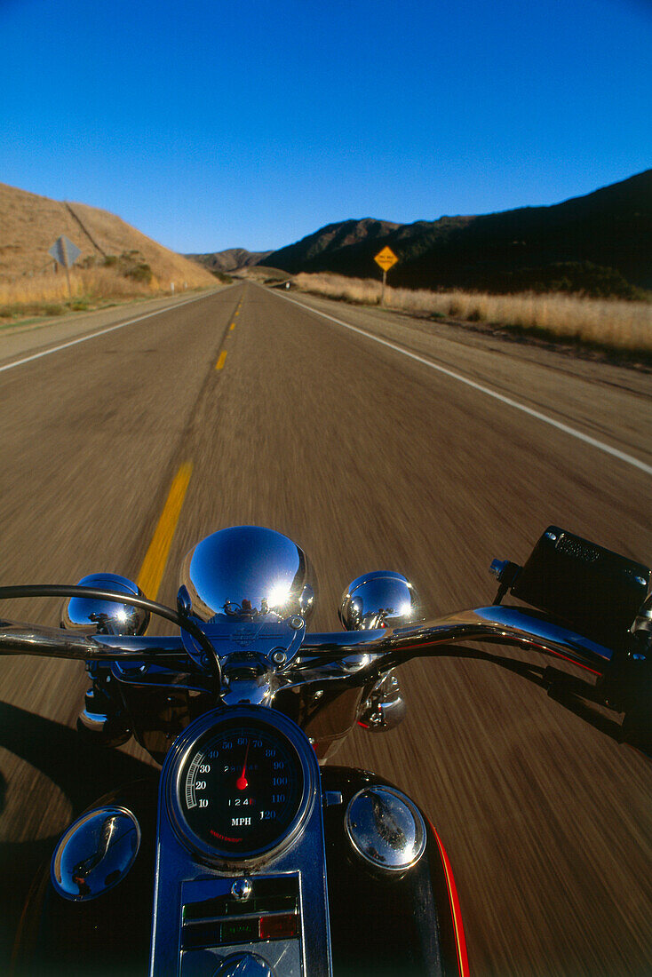 Harley Davidson on road between Lompoc and Santa Barbara, Highway No. 1, California, USA