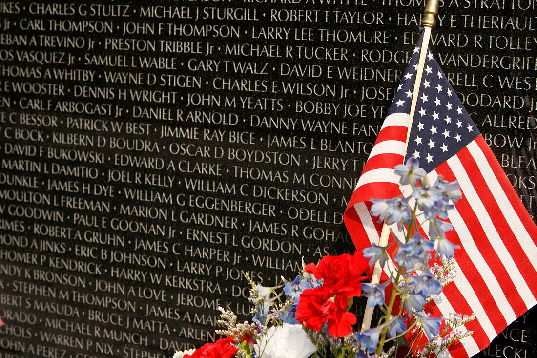 Vietnam Veterans Memorial with wreath and flag, Washington DC, United States, USA