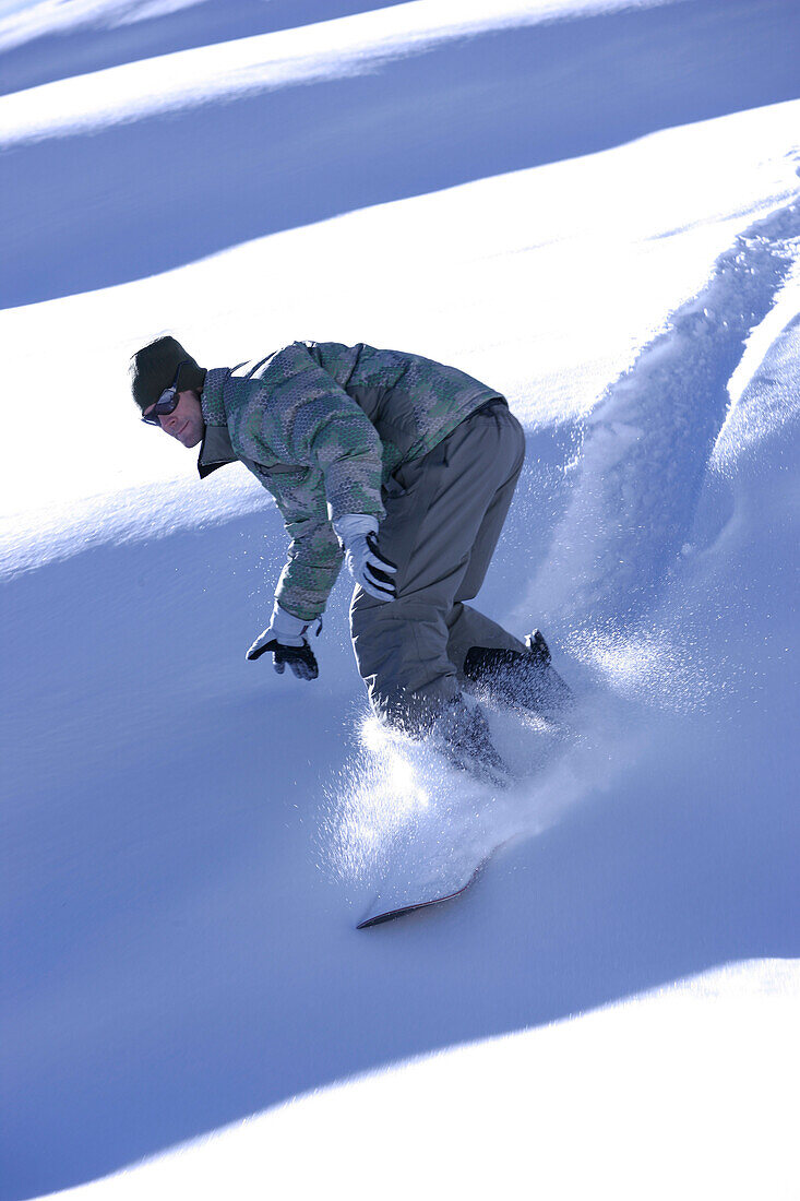 A man having snowboard lessons, Hintertux Glacier, Tyrol, Austria