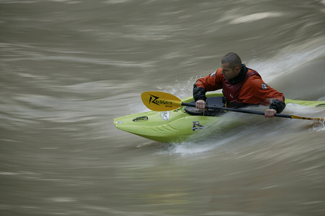 Man in a Kayak in the river Inn near Crazy Eddy in Silz, Haiming, Tyrol, Austria