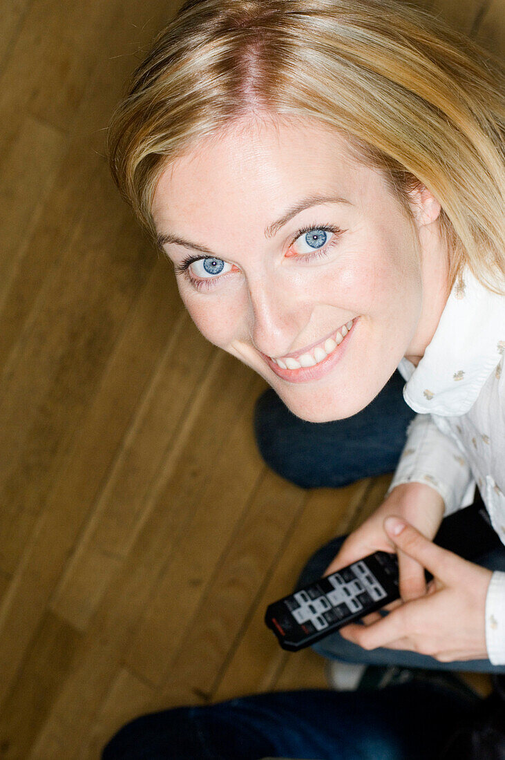 Young woman smiling at camera, portrait