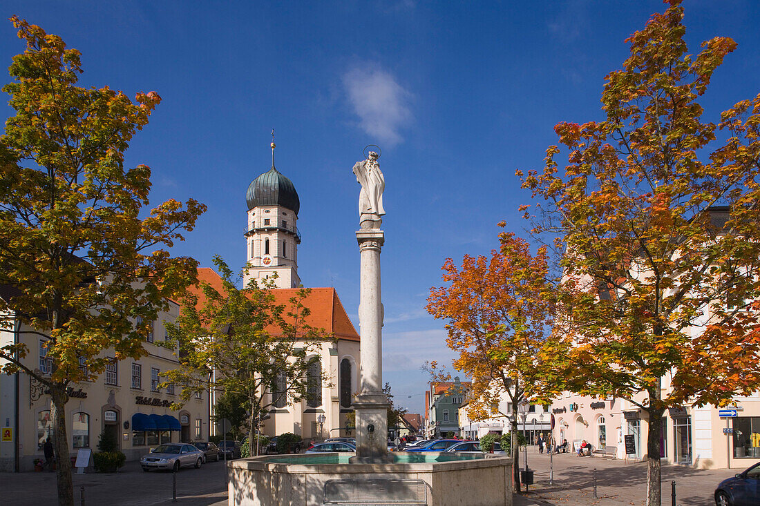 Market square with fountain and church in background, Allgaeu, Upper Bavaria, Bavaria, Germany