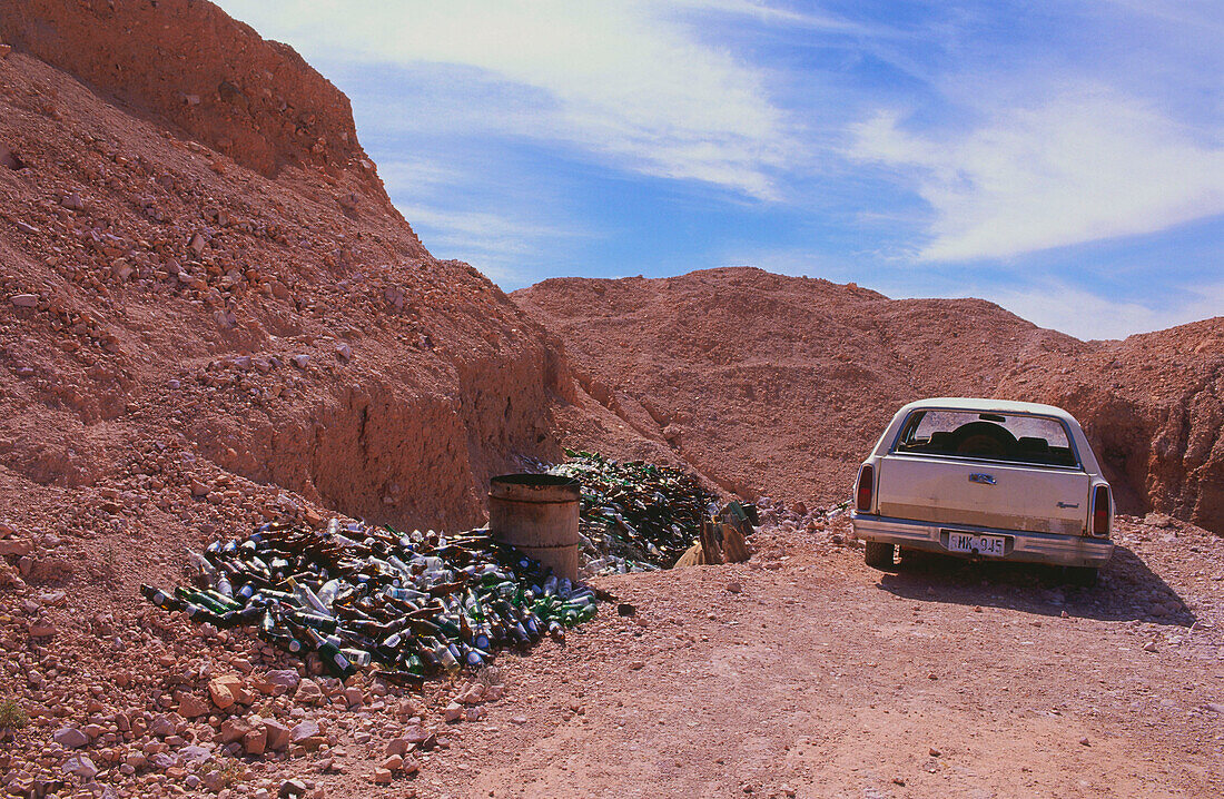 Glass for recycling and junk car, Coober Pedy, the opal capital of the world, Crocodile Harry, South Australia, Australia