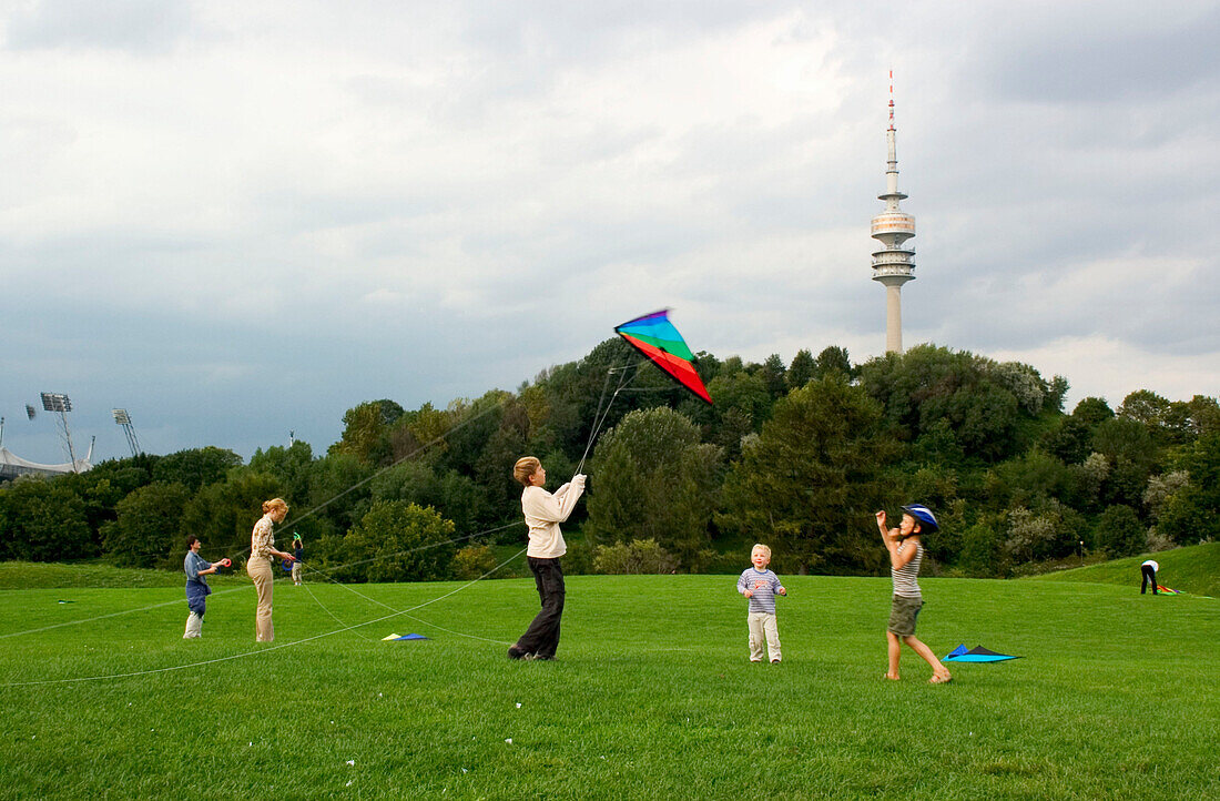Flying Kites in front of the Olympic Tower, Schwabing, Munich, Bavaria Germany