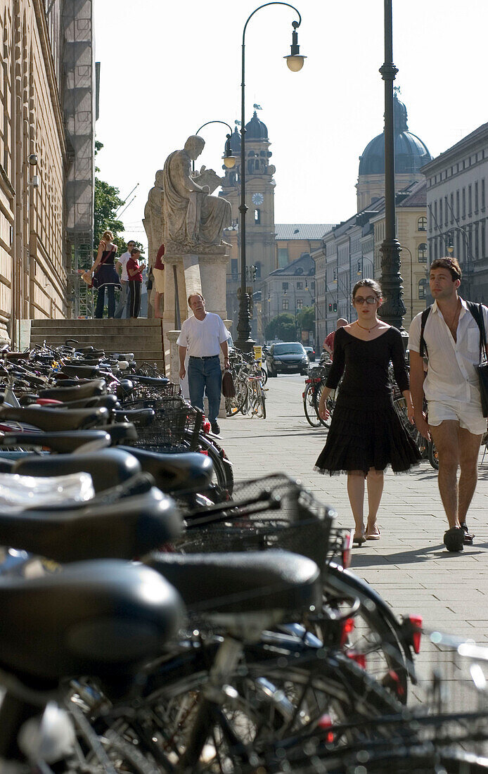 Students and Bicycles at Ludwig-Maximilians-Universität in Ludwigstrasse, Schwabing, Munich, Bavaria, Germany