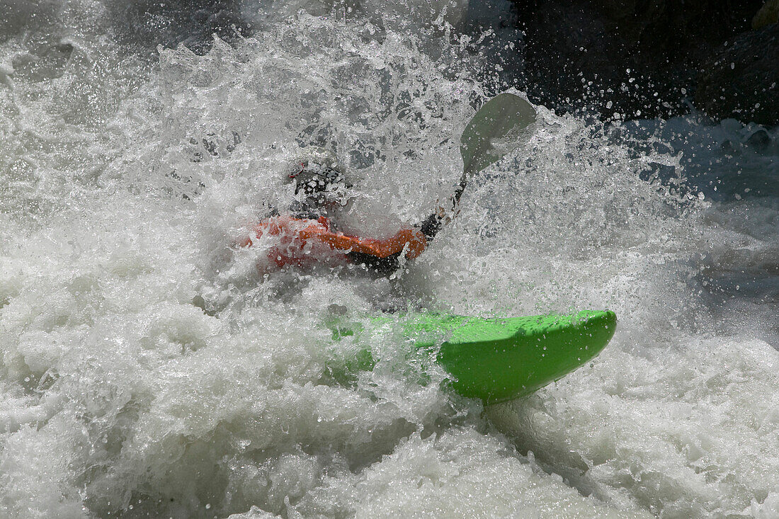 Man kayaking in rapid waters, Lauterbrunnen, Canton Bern, Switzerland