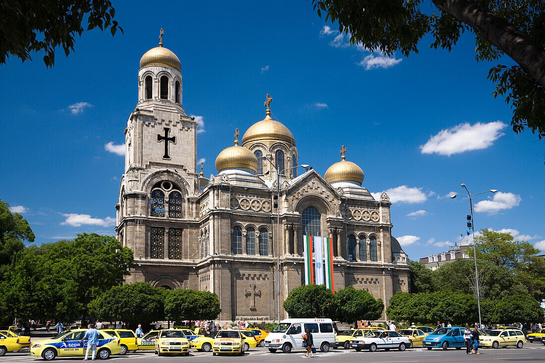 Cars in front of Chram Sveta Uspenie Bogorodicno cathedral at Varna, Bulgaria, Europe