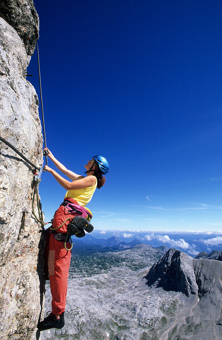 climber on fixed rope route Irg, Koppenkarstein, Dachstein range, Styria, Austria