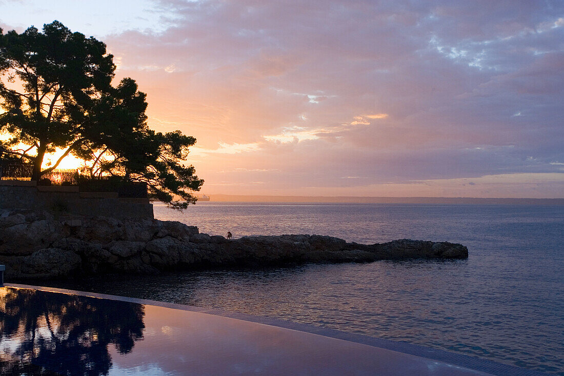 Hotel Maricel and swimming pool at sunrise, Palma, Majorca, Spain