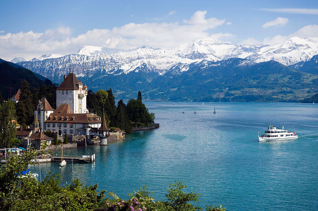 Excursion Boat at Castle Oberhofen at Lake Thun, Eiger (3970 m), Mönch (4107 m) and Jungfrau (4158 m) in background, Oberhofen, Bernese Oberland (highlands), Canton of Bern, Switzerland